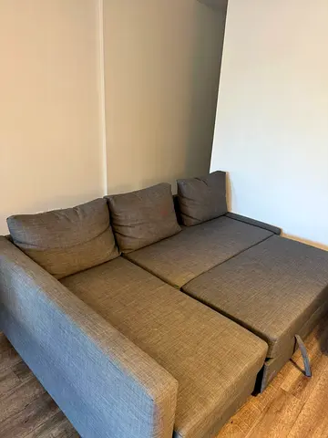 Grey L-shaped Sofa Bed - Compact and Comfortable