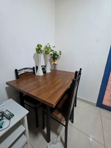 Wooden dining table with 4 chairs - compact set