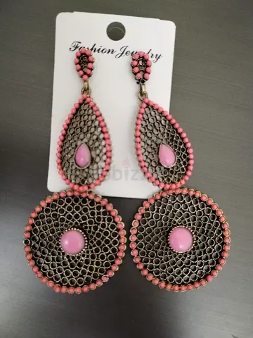 Long vintage-style pink beaded drop earrings
