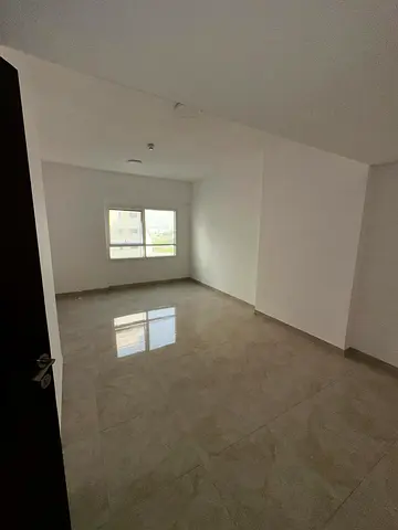 Largest two-bedroom apartment for annual rent in Al Majaz 2, with three bathrooms, gym, swimming pool, and free parking. New building with very spacio