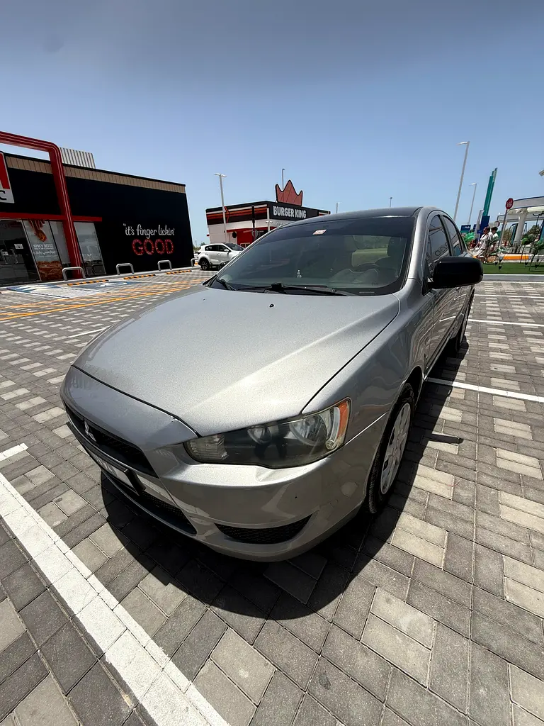 Mitsubishi Lancer EX 2009 — photo 1 of 5
