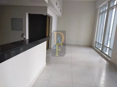 VACANT 1B/R AC FREE, WITH EQUIPPED KITCHEN WITH COVERED PARKING