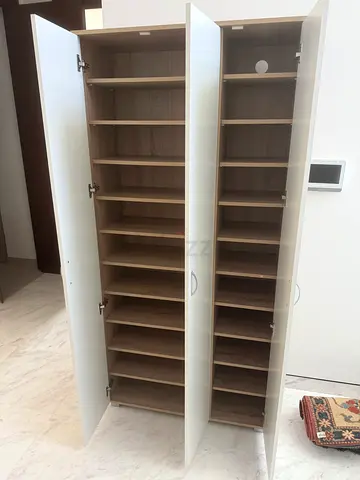 Tall white shoe cabinet / wardrobe with multiple shelves, good condition