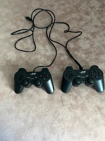 Pair of wired PS2-style controllers (2 controllers)