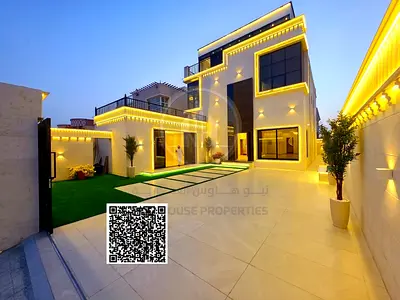 A luxurious villa for sale in Al Rawda, located in an exceptiona