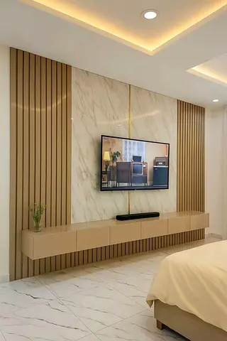 Wall-mounted TV unit with marble panel and floating console (beige/wood finish)