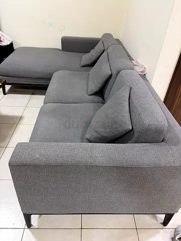 Grey L-shaped Fabric Sofa - Good Condition