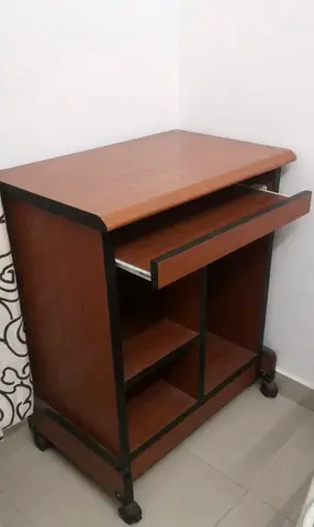 Compact Wooden Computer Desk with Wheels and Keyboard Tray selling for cheap moving out