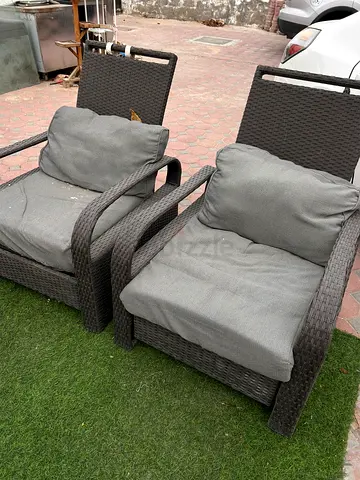 Pair of brown rattan outdoor armchairs fully recliners  with cushions - good condition