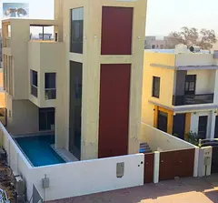 First occupancy villa in Al Zahia with private pool, large terrace, and central air conditioning.