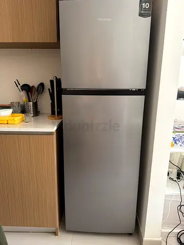 Silver two-door refrigerator with bottom freezer - good condition