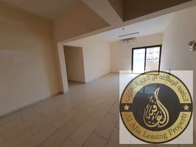 OFFER ON 2 BR HALL APARTMENTS 35K,1 CHEQ 40K,4,6,CHEQS FOR RENT ONLY FOR FAMILY SPILIT/AC NEXT TO PIZZA HUTT ON MAIN AL WAHDA STREET NEAR CITY CENTER