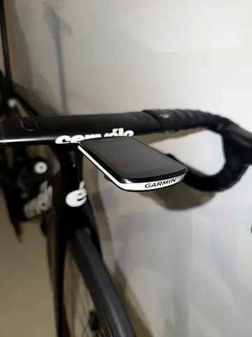 Garmin Edge bike computer mounted on road bike handlebars