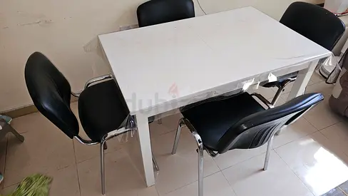 White Rectangular Dining Table with 4 Black Chairs - Good Condition