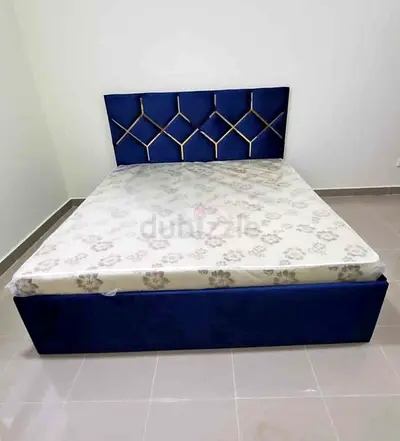 Blue Velvet Bed Frame with Patterned Headboard and Mattress