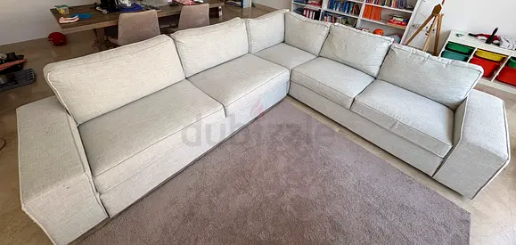 Large L-shaped KIVIK IKEA beige fabric sofa — good condition