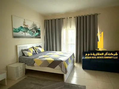 A fully furnished one-bedroom apartment with a hall, with sea view balcony, including all services, with a gym, swimming pool, and private parking.