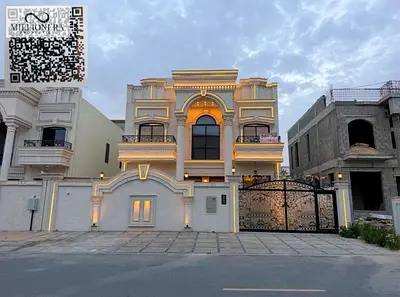Luxury villa for sale in Al Helio 2 opposite Al Hamidiya Park classic stone design VIP finishing 6 master bedrooms with roof