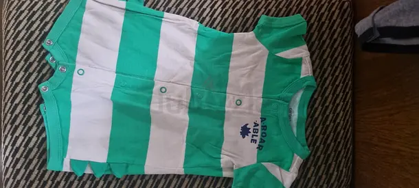 Green and white striped baby bodysuit / romper - size newborn/0-3 months