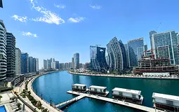Waterfront 2BR + Private Terrace | Prime Location
