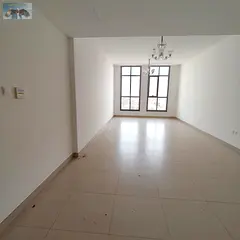 For annual rent in Ajman, a three-bedroom apartment with a living room and a storage room in a new t