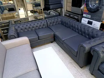 Used L-shaped Chesterfield Sofa - Dark Grey Leather, Good Condition