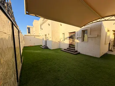 3-bedroom villa with a majlis, living room, internal courtyard, and rooftop for annual rent in Ajman.