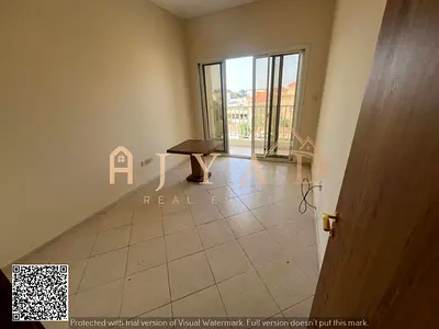 Annual 1BR hall for rent in Al Jurf 2, Ajman opposite Al Aqsa School. Payment 4 or 6 cheques, secur