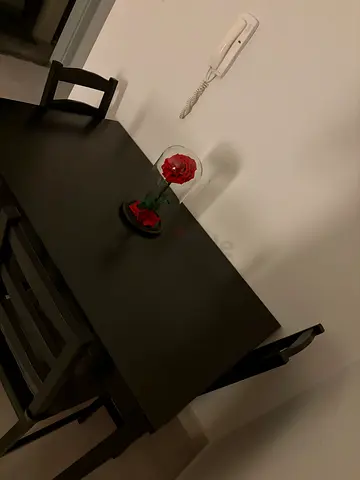 Black dining table with 4 chairs - excellent condition-ikea-used rarely
