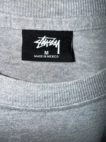 Pre-loved Stussy grey sweatshirt, size M, made in Mexico
