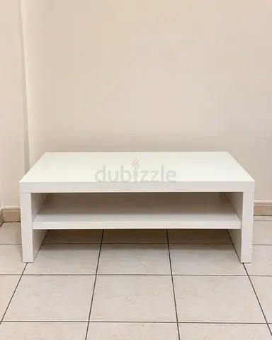 White rectangular coffee table with lower shelf - good condition