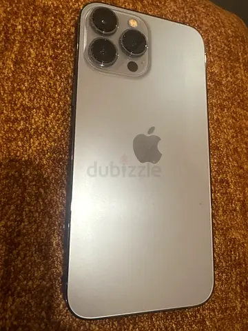 A new  Apple iPhone 13 Pro Max - Silver, Good Condition and battery 100%