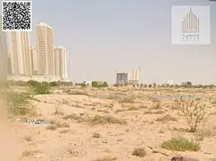 Commercial land Al Alia Ajman G+4 freehold sale