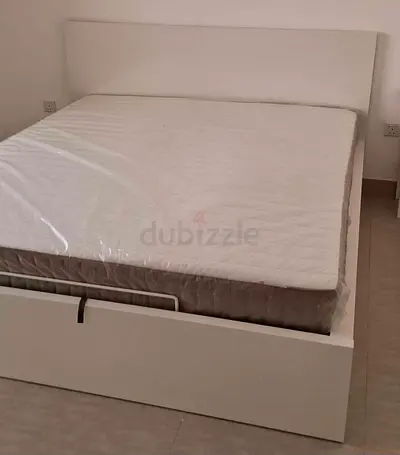 Ikea  white hydrolic bed frame with ikeam mattress in very good and perfect condition used like new