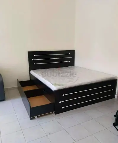 Double bed with storage drawers — brand new