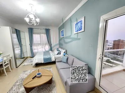 Separate kitchen studio apartment with balcony for monthly rent, all bills included, in Al Yasmin Towers, opposite City Center.
