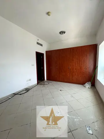 Special Offer in Al Majaz 1! 1BHK with 2 Bathrooms for Rent – Deferred Deposit & Parking Available 🏙️✨