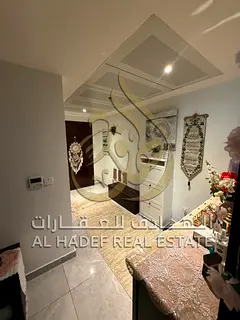 A storage room with a balcony overlooking Al Mamzar, Dubai, private parking, gym, and swimming pool,