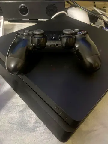 Ps4 slim with controller and 2 games and wires