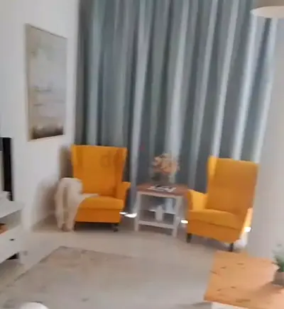 Quality 2 Orange Sofa chairs like new for Sale..