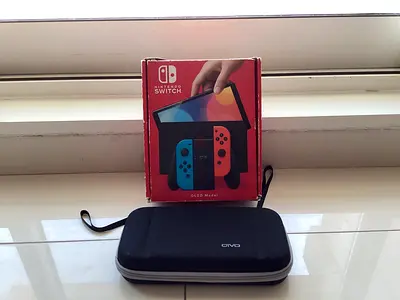 Nintendo switch OLED model with case