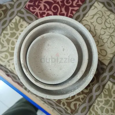 Set of three stone plant saucers