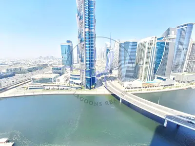غرفة نوم واحدة مفروشة | **نورا** الخليج التجاري | إطلالة على القناة