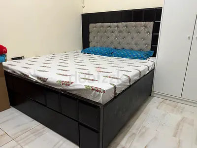 King size storage bed with tufted headboard - good condition
