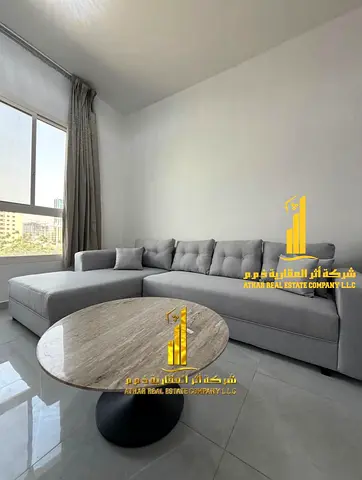 Two-bedroom apartment with a living room, newly furnished, for monthly rent in Ajman - Al Rashidiya 2 - next to the Ruler's Palace