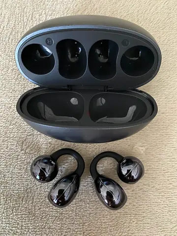 Lightly used pair of wireless true earbuds with charging case - black