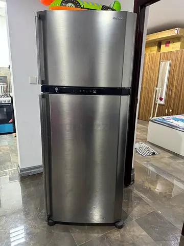 Good condition double-door refrigerator - stainless steel finish