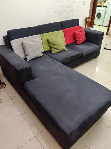 L-shaped dark grey fabric sofa with chaise - good condition