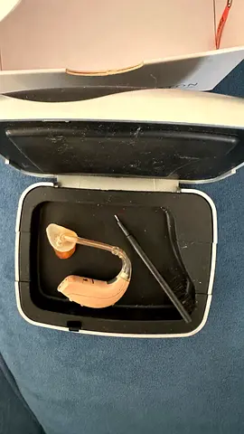 Used behind-the-ear hearing aid with case