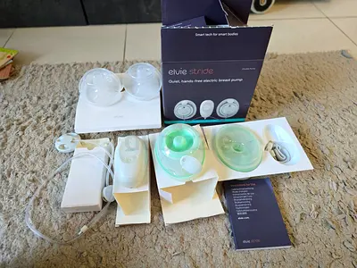 Elvie Stride Hands-free Electric Breast Pump with Accessories - Brand New Condition for quick sell.